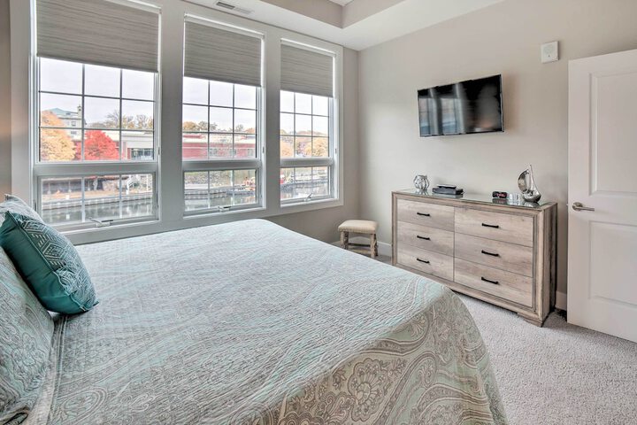 Luxe Manistee Condo w / Balcony & River Views!