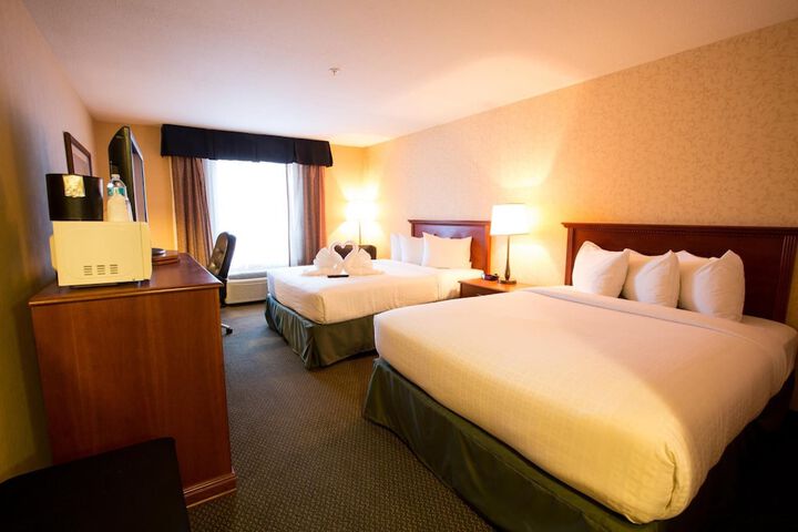 Merit Hotel & Suites