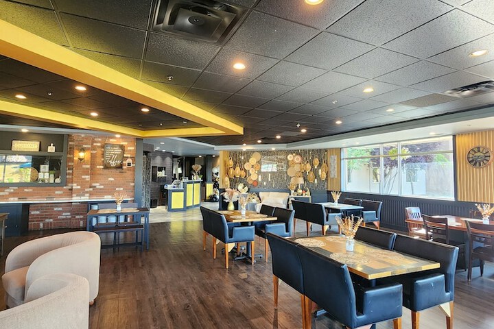 Merit Hotel & Suites