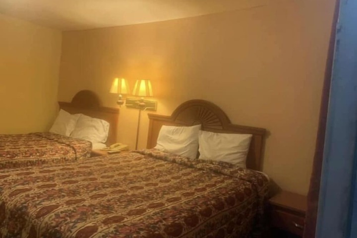 Economy INN poteau