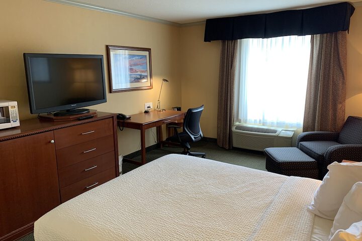 Merit Hotel & Suites