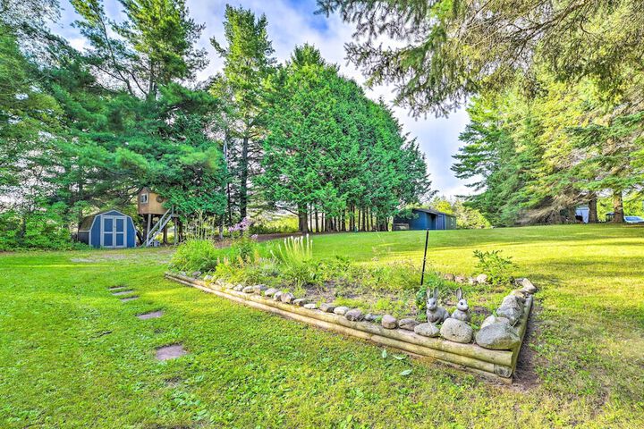 Riverfront Home w / Dock 6 Mi to Cheboygan!