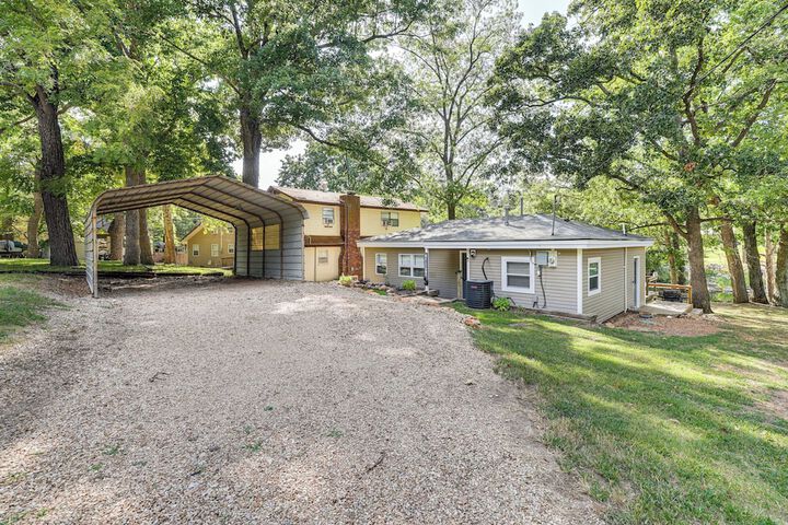 Deck + Dock Access: Lakefront Grove Cabin!
