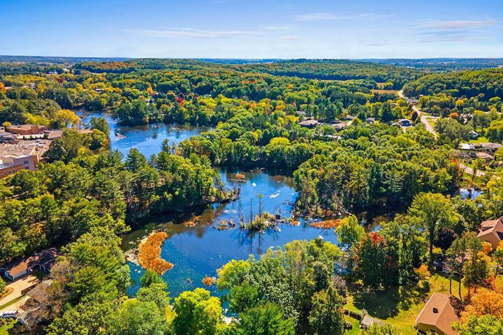 Antiquing & Fishing: Riverfront Waupaca Home!