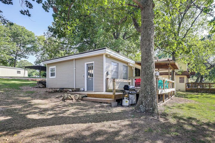 Deck + Dock Access: Lakefront Grove Cabin!