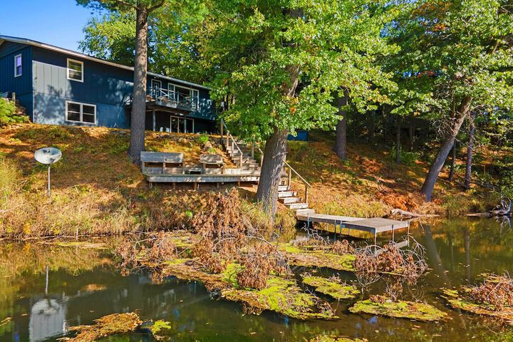 Antiquing & Fishing: Riverfront Waupaca Home!