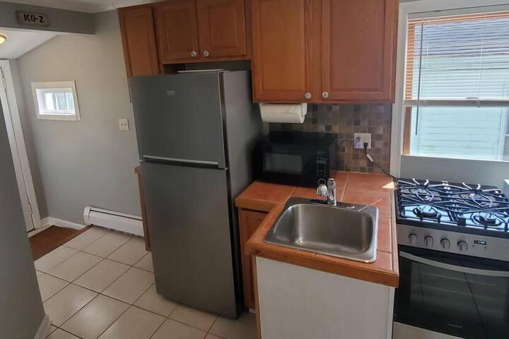 Beachy Bay Breeze Bungalow 2BR with parking and close to many amenities.