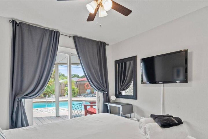 SunKissed in St. Pete is a 3 BR Home with Heated Pool and great outdoor space Near the Beach
