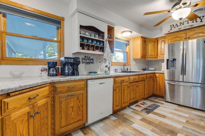 Antiquing & Fishing: Riverfront Waupaca Home!
