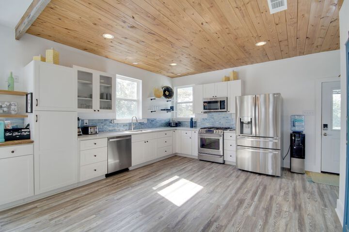 Sunny Waveland Home Rental w / Pool: Walk to Beach!