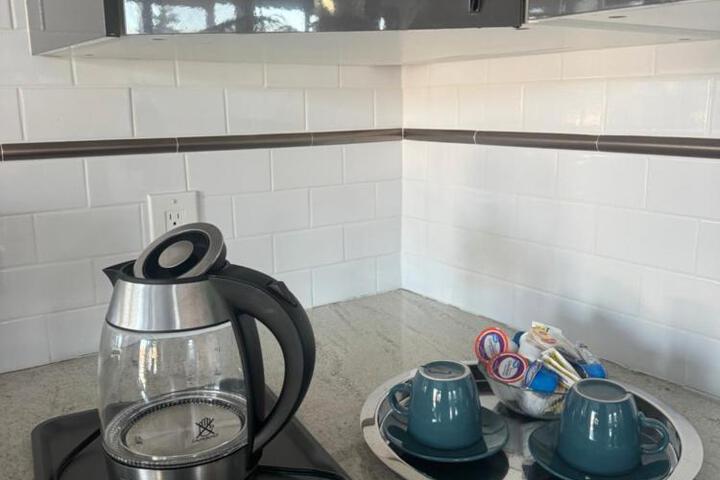 One bedroom with modern kitchen balcony with water view
