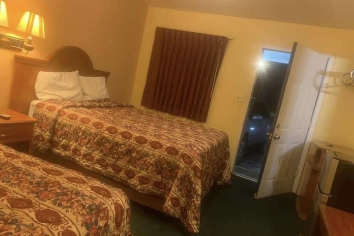 Economy INN poteau