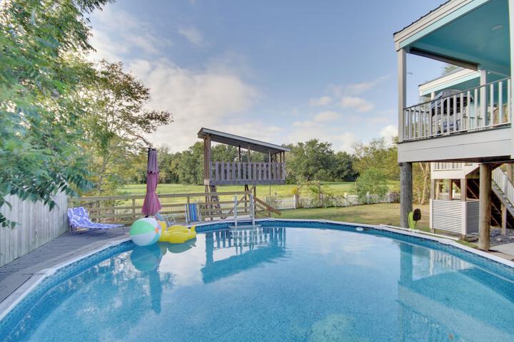 Sunny Waveland Home Rental w / Pool: Walk to Beach!