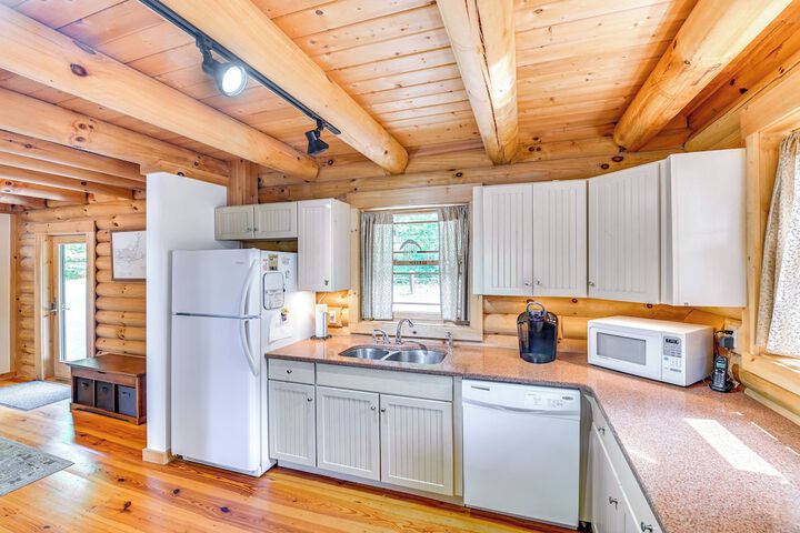 Lakefront Corinth Log Home: Private Dock Fire Pit
