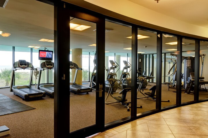 Calm Seas - Holiday Isle #119 - Tremendous Views a Beautiful Gulf Front Pool, A Heated Indoor Pool, Jacuzzi, Steam Room, & Gulf View Fitness Center. 2 Bedroom Condo by RedAwning
