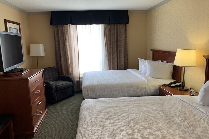 Merit Hotel & Suites