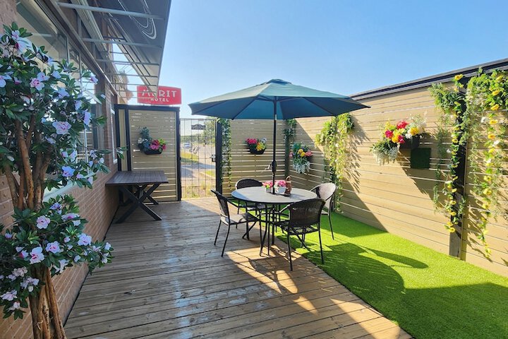 Merit Hotel & Suites