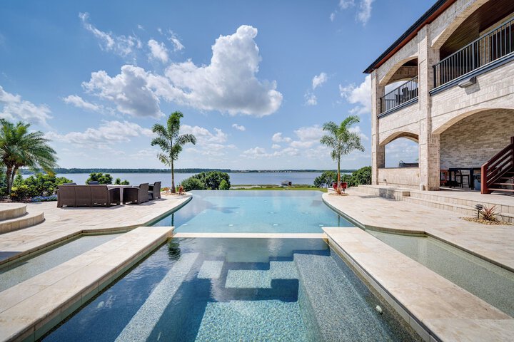 Groveland Home w / Pool: Luxurious Lakefront Oasis!