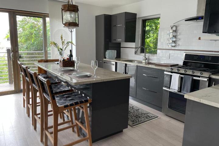 One bedroom with modern kitchen balcony with water view