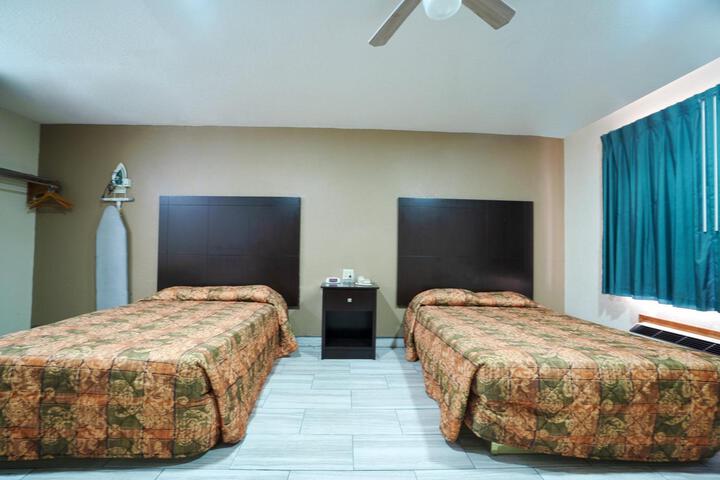 EXECUTIVE INN AND SUITES