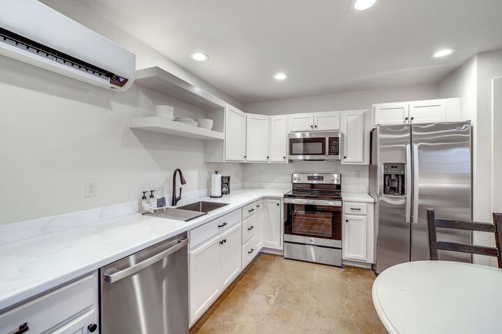 Central & Modern Studio w / Workspace in Owasso!