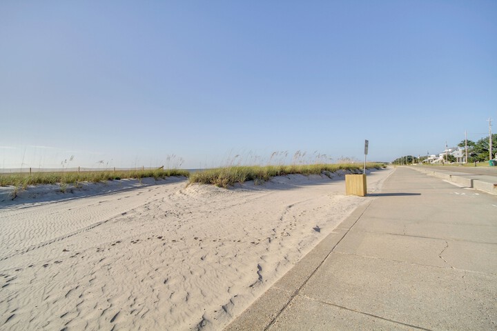 Sunny Waveland Home Rental w / Pool: Walk to Beach!