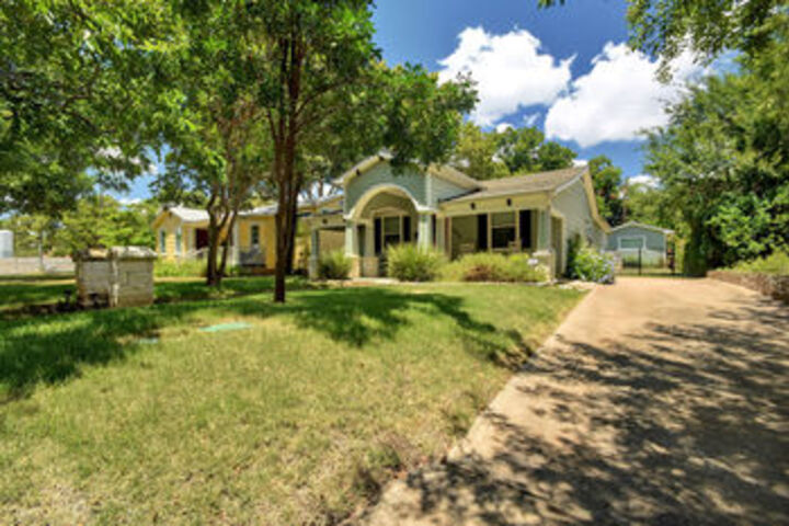 Convenient City Spot with Green Space by RedAwning