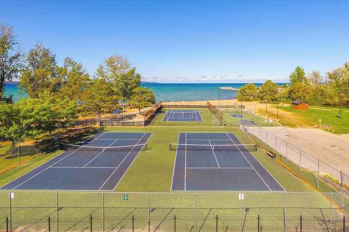 Elk Rapids Condo w / Balcony Overlooking Elk Lake!