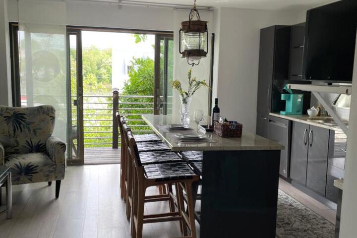 One bedroom with modern kitchen balcony with water view