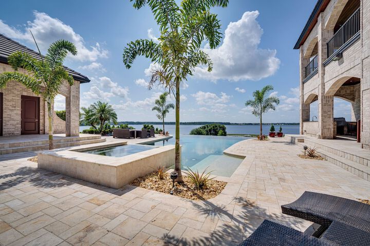 Groveland Home w / Pool: Luxurious Lakefront Oasis!