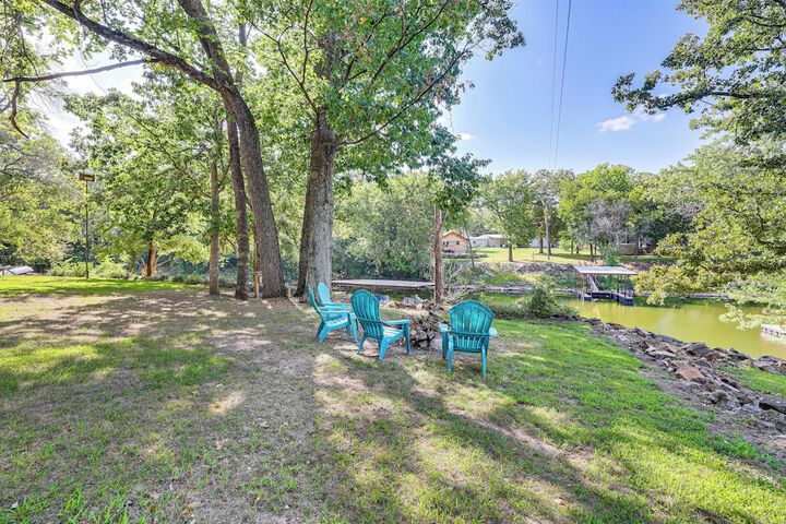 Deck + Dock Access: Lakefront Grove Cabin!