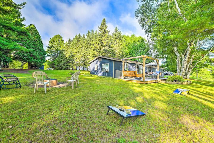 Riverfront Home w / Dock 6 Mi to Cheboygan!