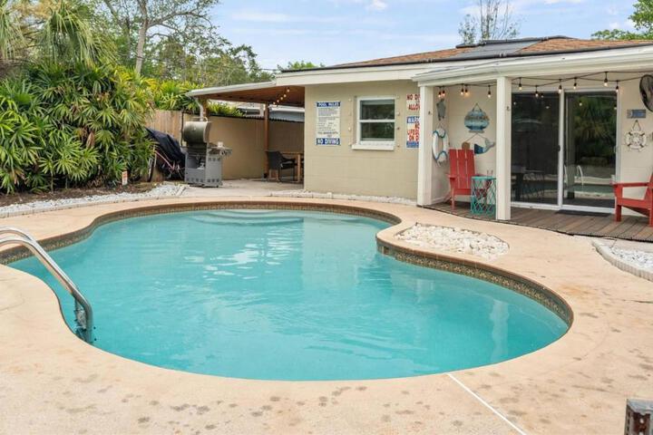 SunKissed in St. Pete is a 3 BR Home with Heated Pool and great outdoor space Near the Beach