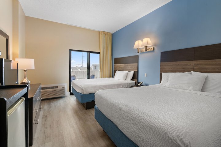Coastal Palms Inn & Suites