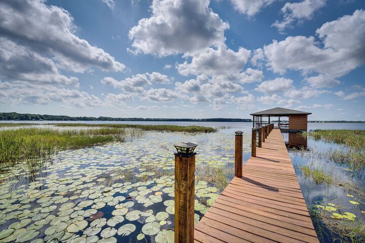 Groveland Home w / Pool: Luxurious Lakefront Oasis!