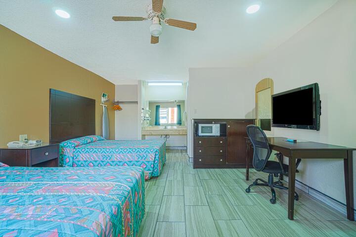 EXECUTIVE INN AND SUITES