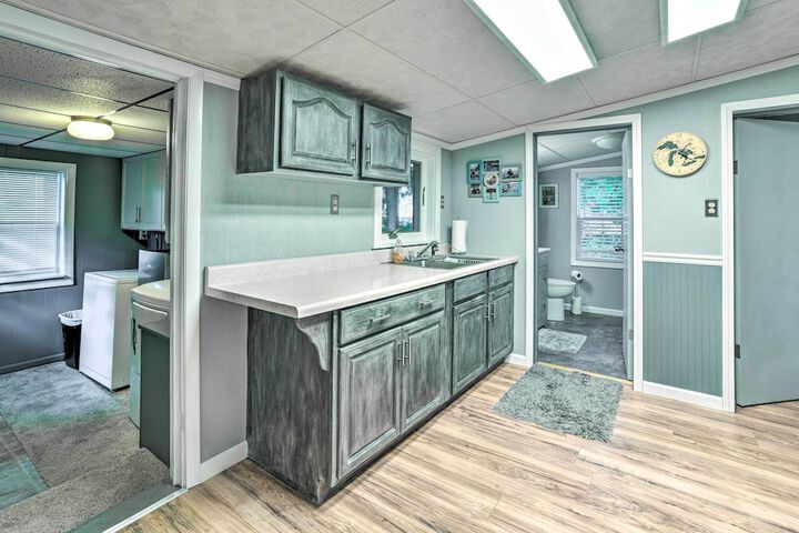 Riverfront Home w / Dock 6 Mi to Cheboygan!