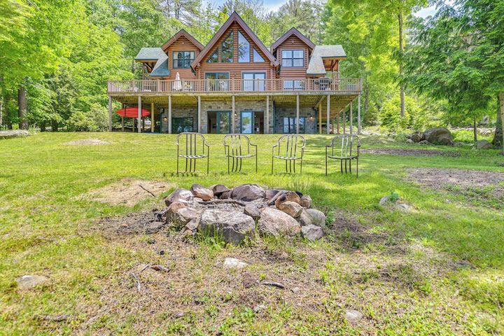 Lakefront Corinth Log Home: Private Dock Fire Pit