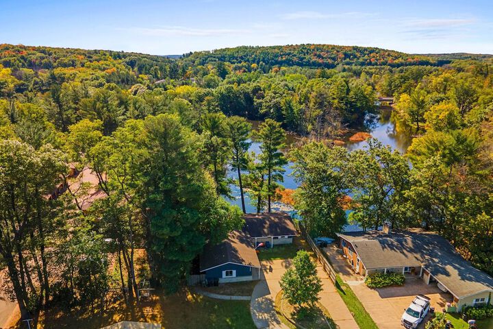 Antiquing & Fishing: Riverfront Waupaca Home!