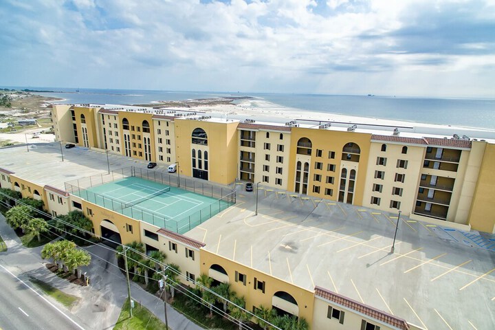 Calm Seas - Holiday Isle #119 - Tremendous Views a Beautiful Gulf Front Pool, A Heated Indoor Pool, Jacuzzi, Steam Room, & Gulf View Fitness Center. 2 Bedroom Condo by RedAwning