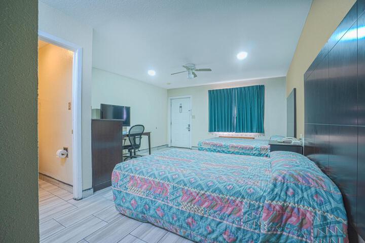 EXECUTIVE INN AND SUITES