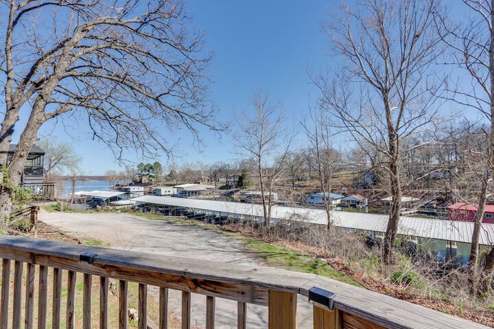 Deck & Boat Dock: Lakefront Cabin in Eucha!