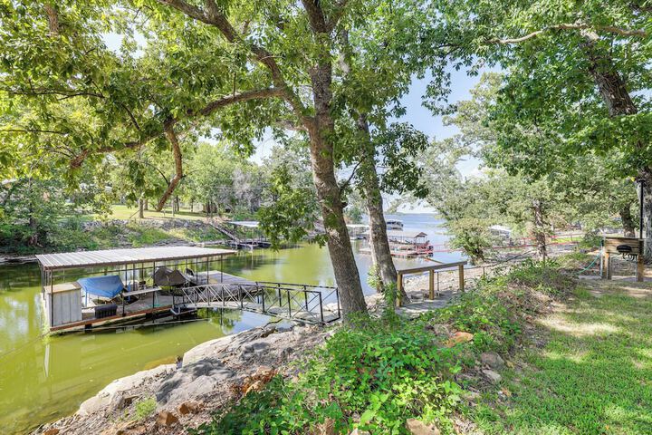 Deck + Dock Access: Lakefront Grove Cabin!