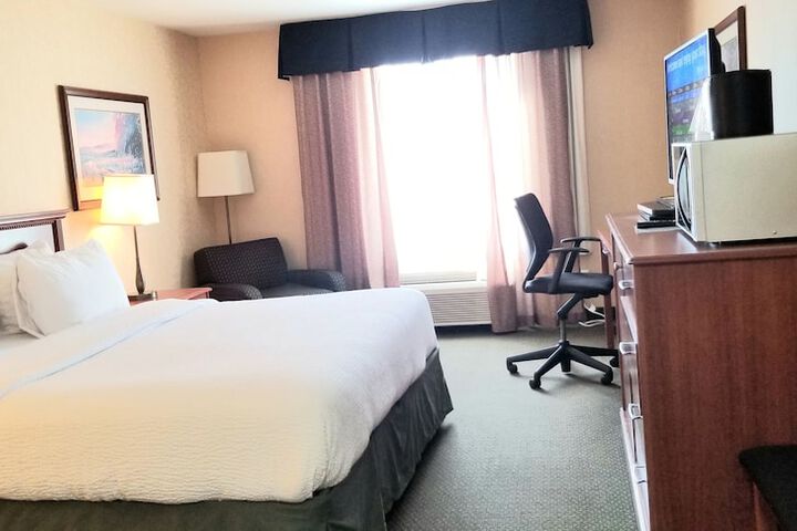 Merit Hotel & Suites