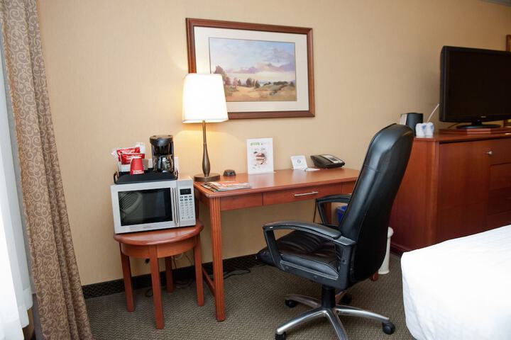 Merit Hotel & Suites
