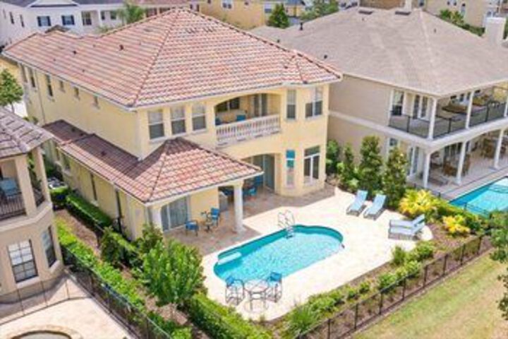 Pool Home in Reunion Resort 4 Br Home by RedAwning