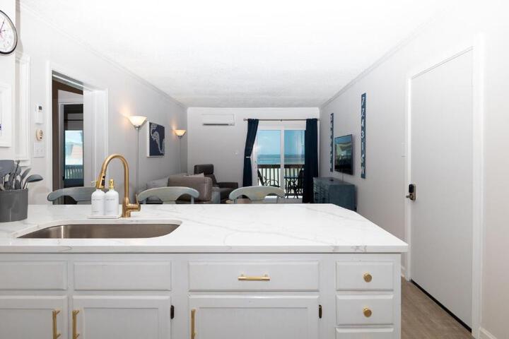 Embrace Oceanfront Elegance: Book Your Stay at Sunrise Oasis