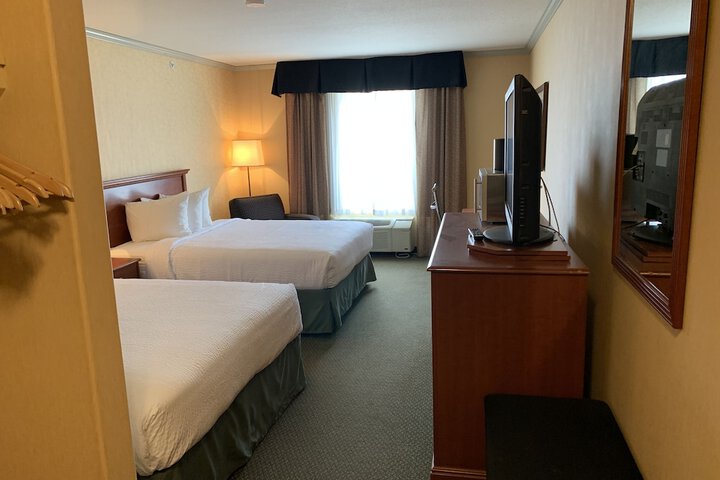 Merit Hotel & Suites