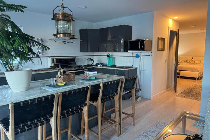 One bedroom with modern kitchen balcony with water view