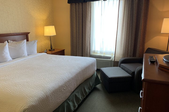 Merit Hotel & Suites